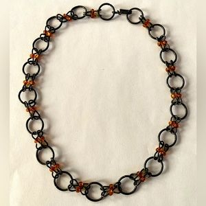 Black metal and bead necklace